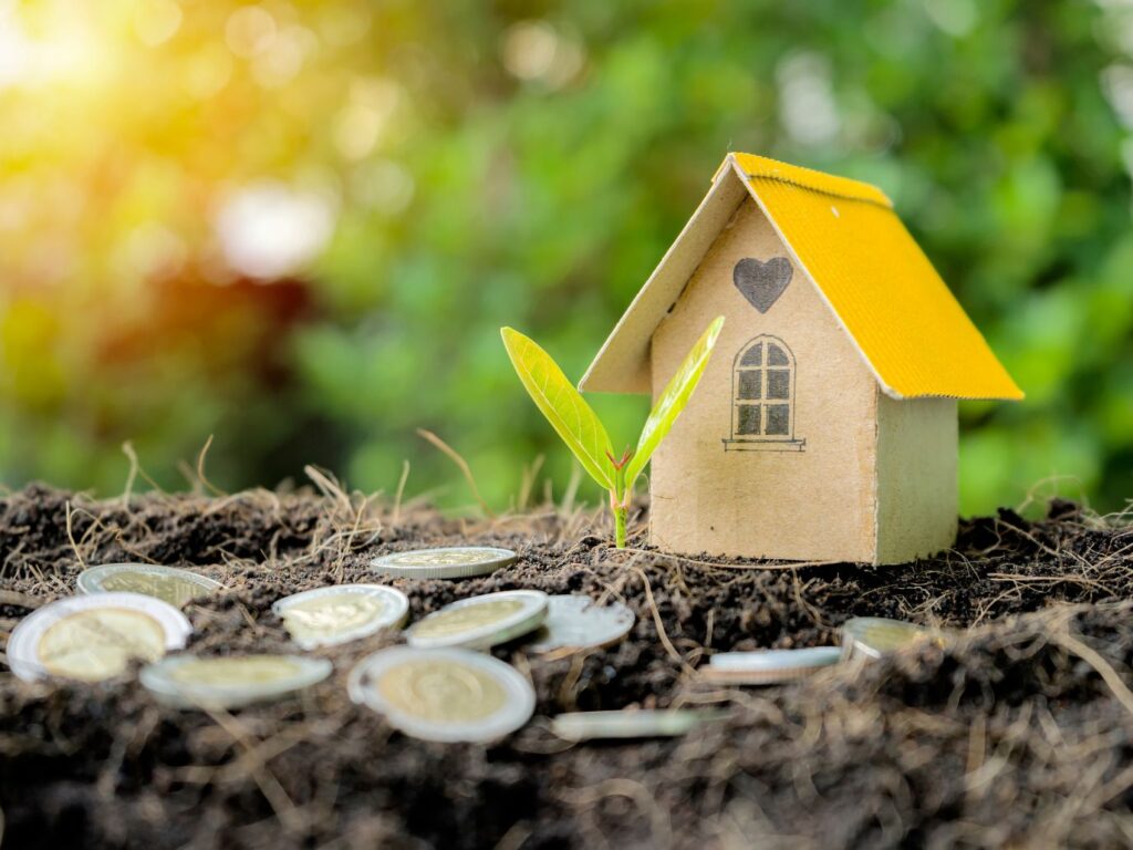 Representação do crescimento financeiro sustentável e dicas sobre como investir em imóveis com foco em longo prazo.